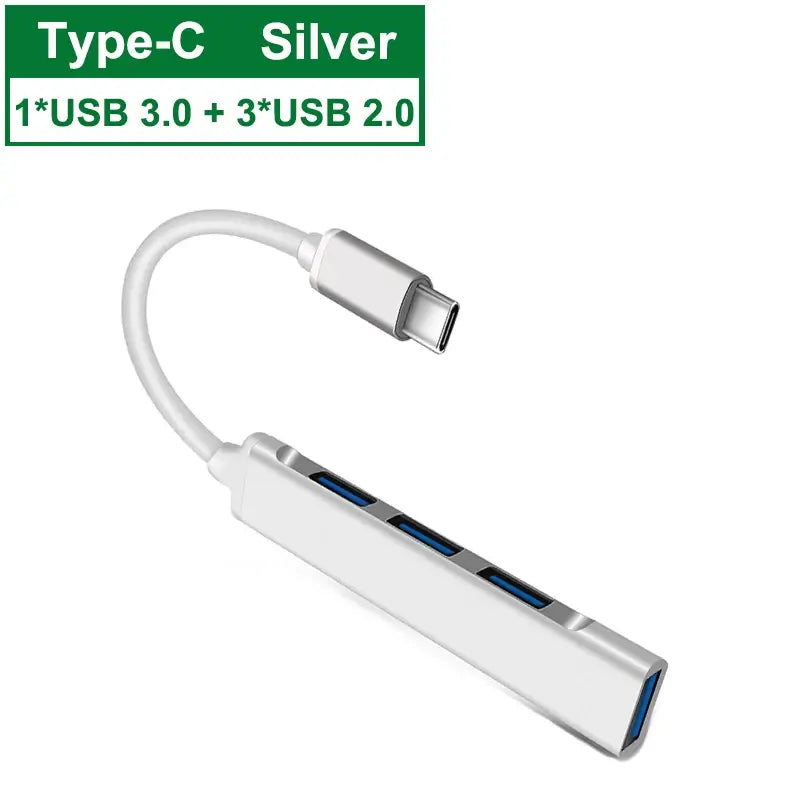 Silver USB Type-C adapter with multiple USB ports on a white background