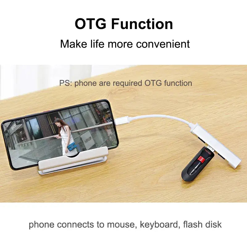 Phone with OTG cable connected to a mouse, keyboard, and flash drive on a wooden surface