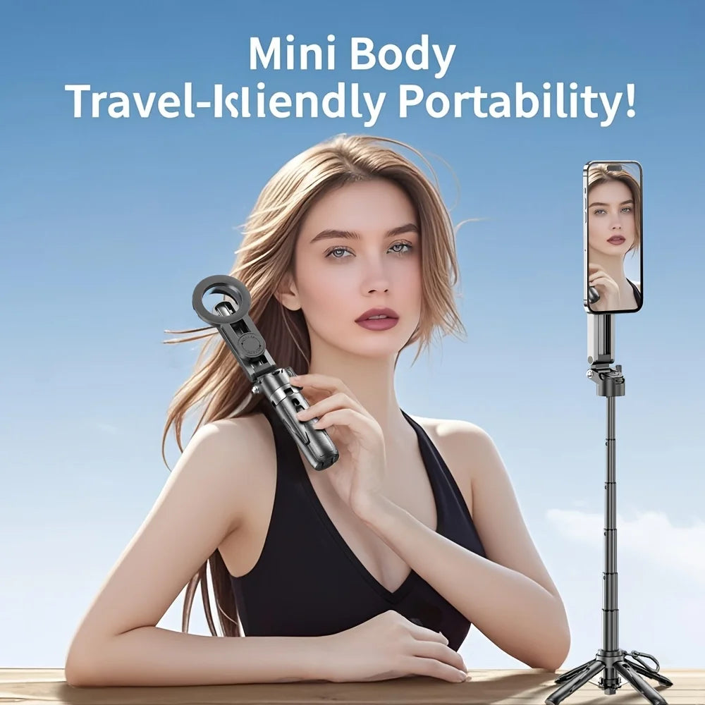 Woman holding a compact selfie stick with a clear blue sky background