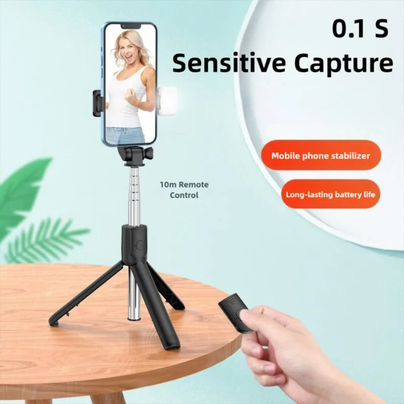 Phone stabilizer with remote control on a table, showing a woman on the phone screen.