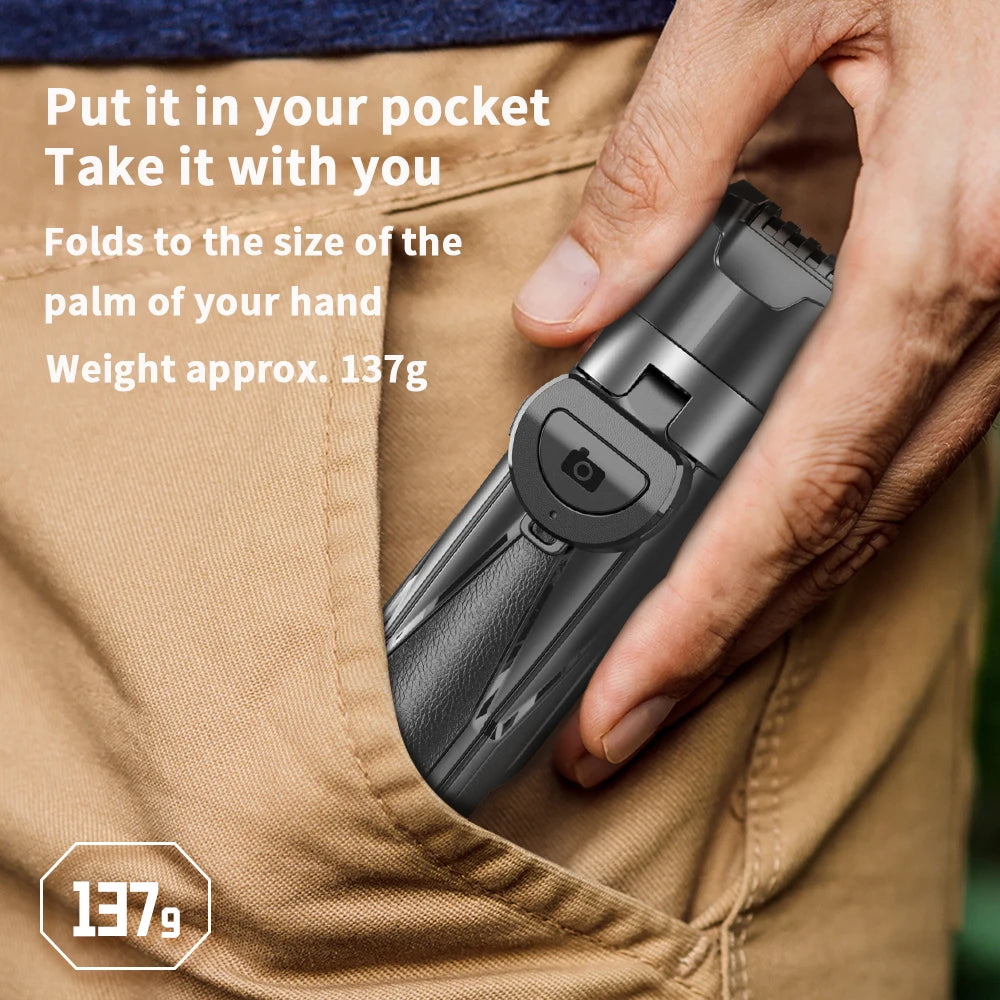 Hand holding a small electronic device with text about its portability and weight.