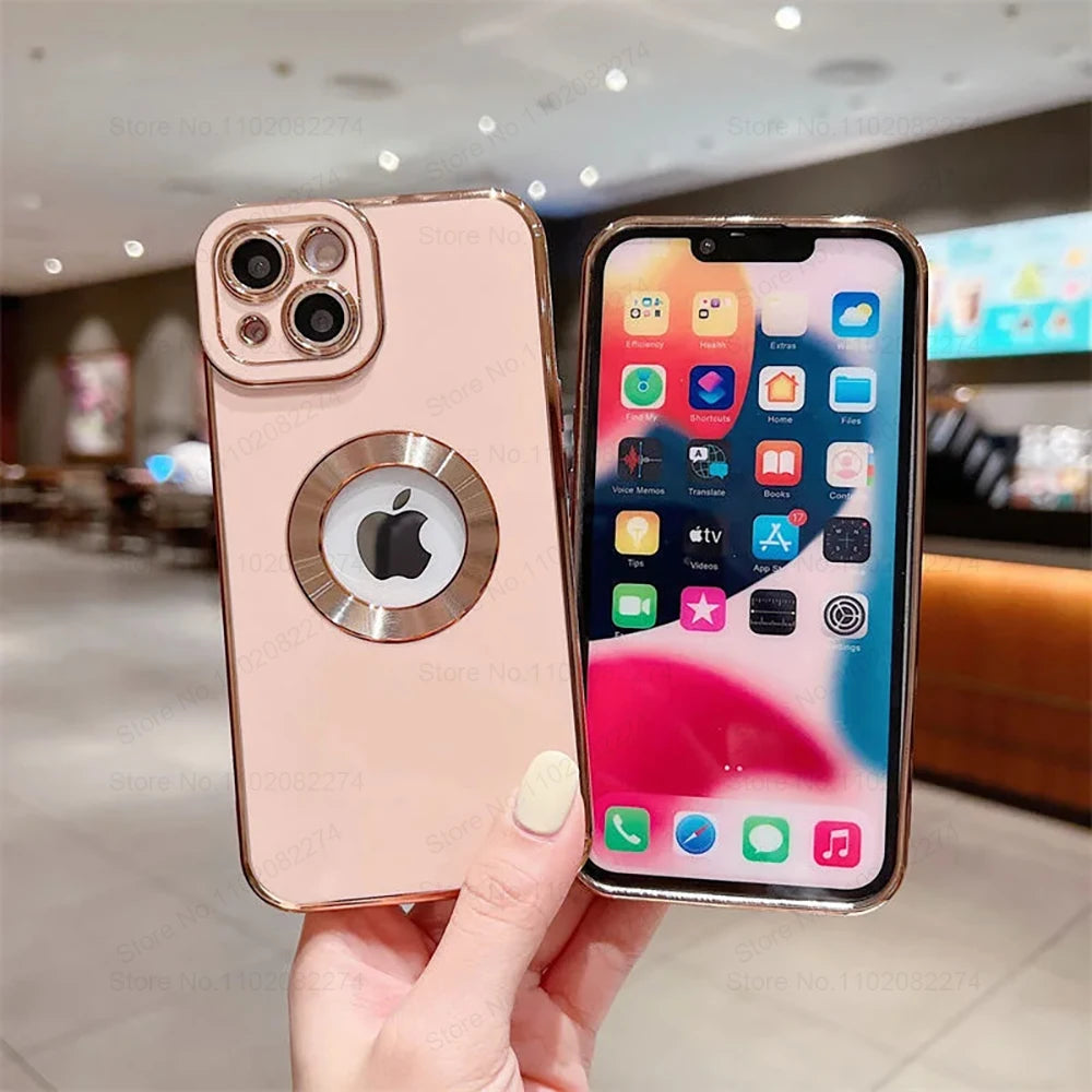 Phone case with Apple logo held by a hand in an indoor setting