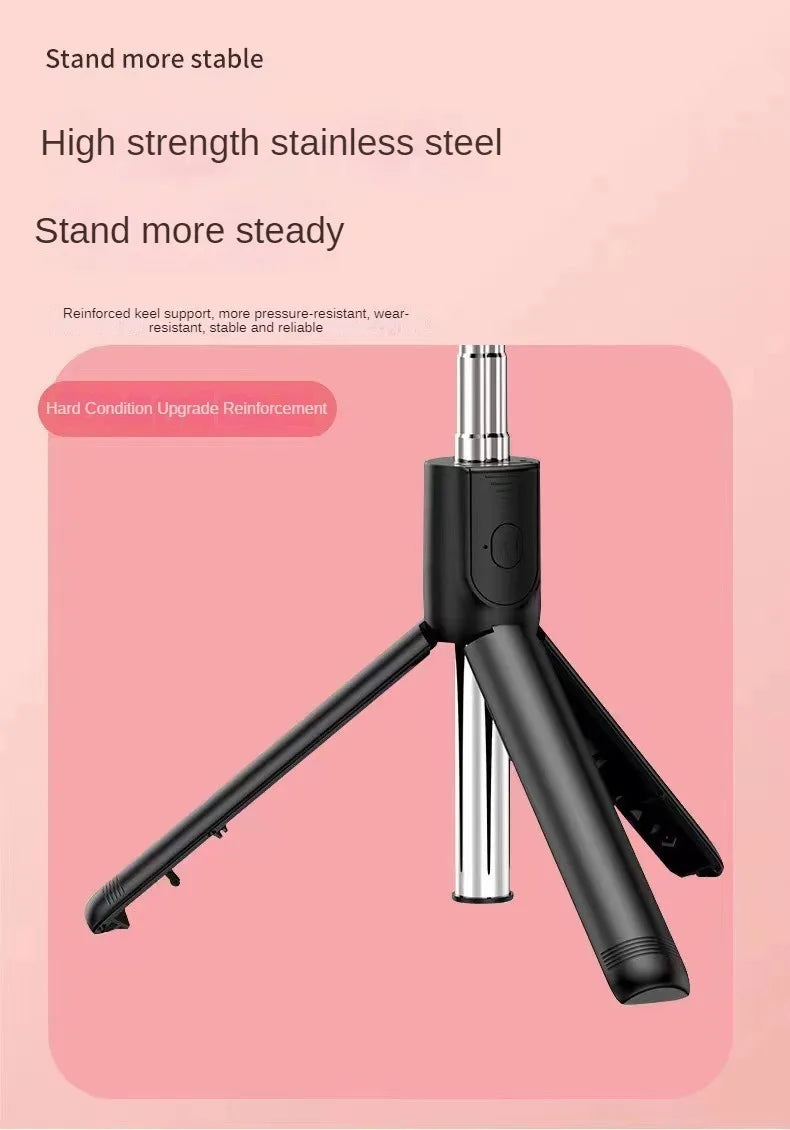 Black tripod with text on a pink background