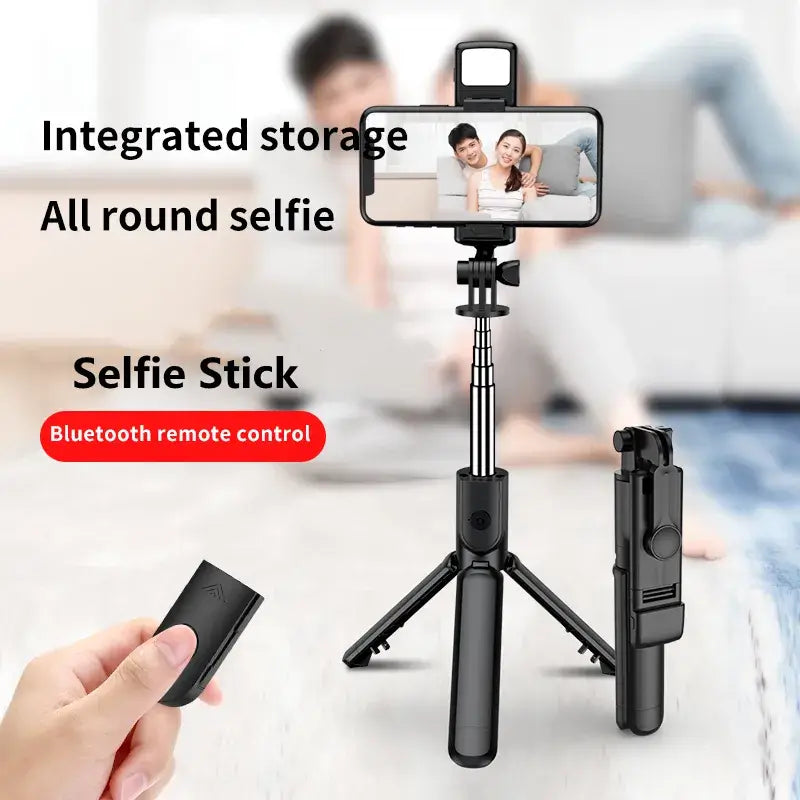 Black selfie stick with Bluetooth remote control held in hand, with text highlighting features on a blurred background