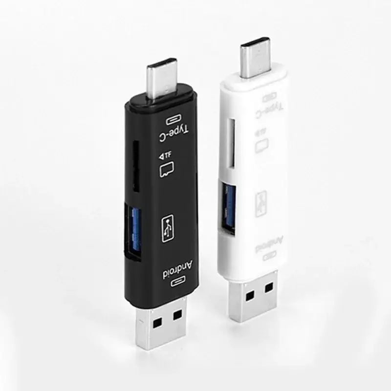 Two USB adapters, one black and one white, on a white background