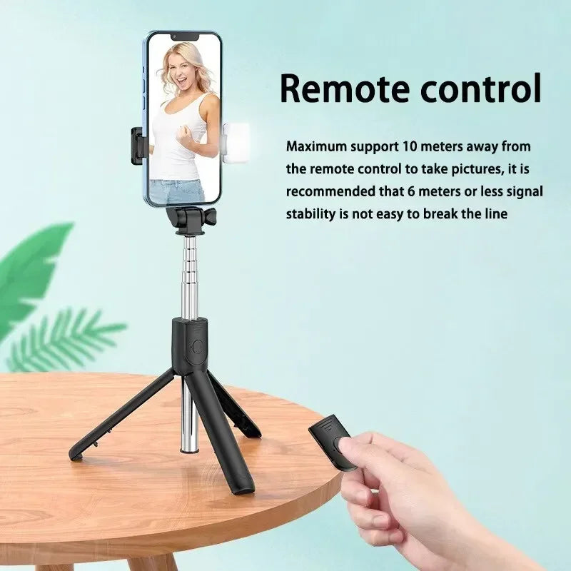 Phone holder with remote control on a table, with text about remote control functionality.