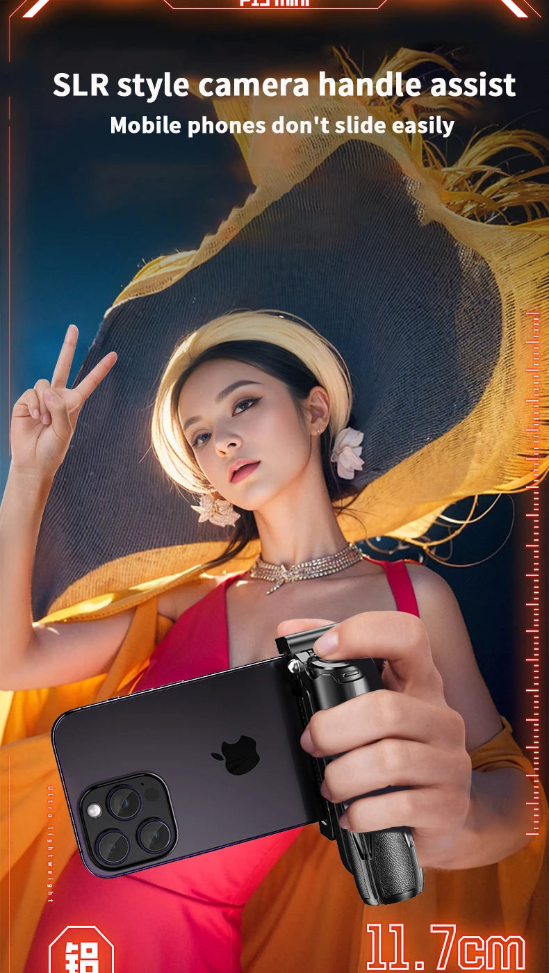Person holding a smartphone with an SLR-style camera handle assist, wearing a large hat.