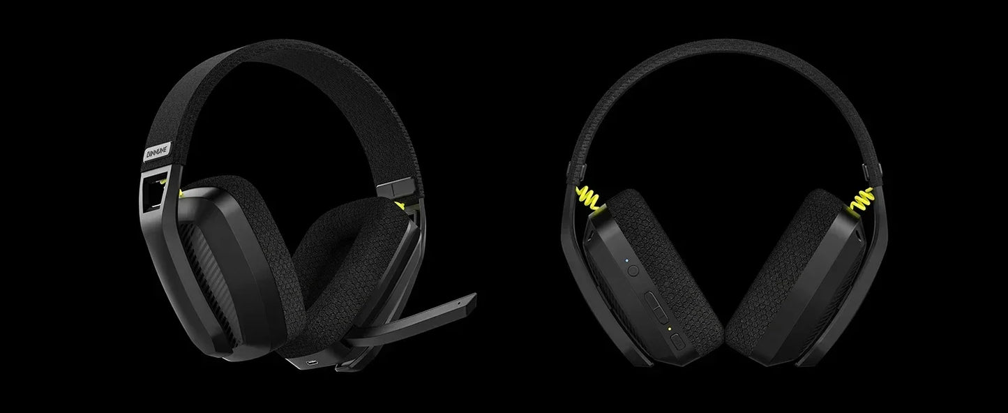 Black gaming headphones with a microphone on a black background