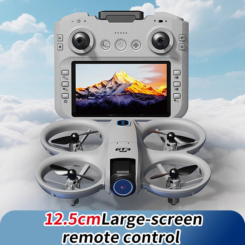 Drone with a large-screen remote control displaying a mountain scene, set against a cloudy sky.