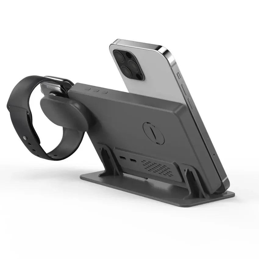 Black phone stand with smartphone, smartwatch, and ring on a white background