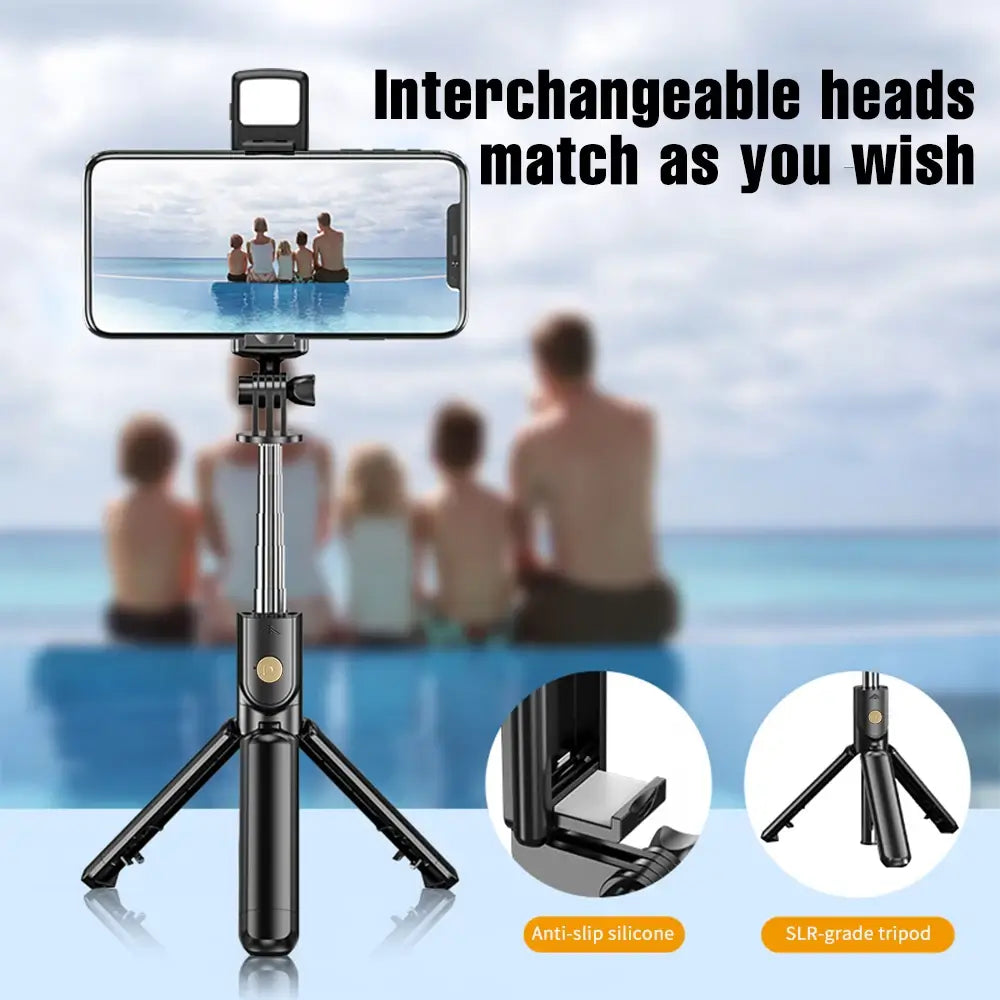 Wireless phone holder with interchangeable heads on a beach background