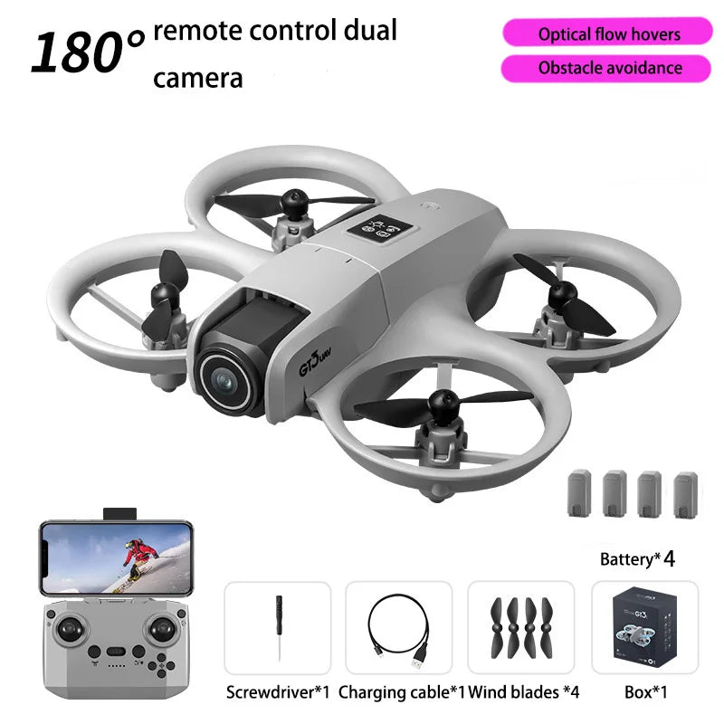 Gray drone with remote control, battery, and accessories on a white background