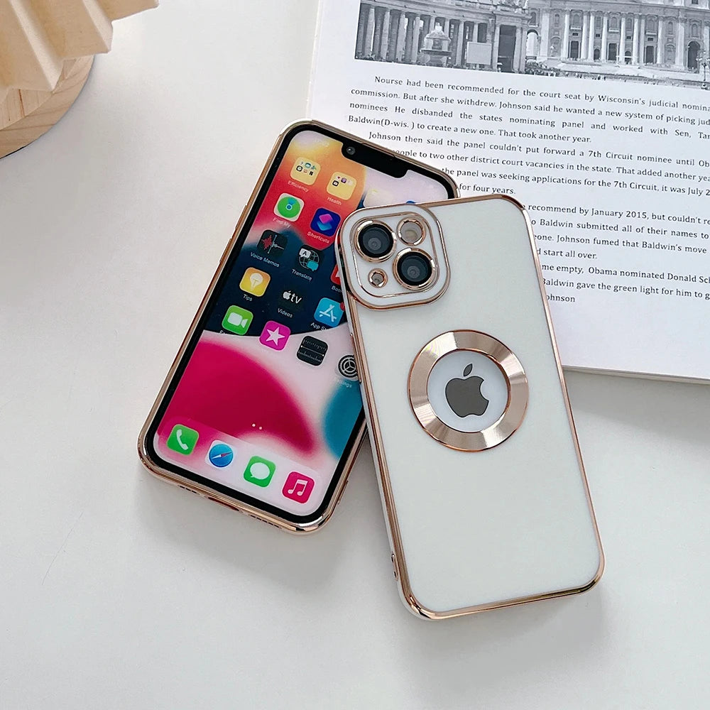 Two smartphones with a metallic ring on a white surface