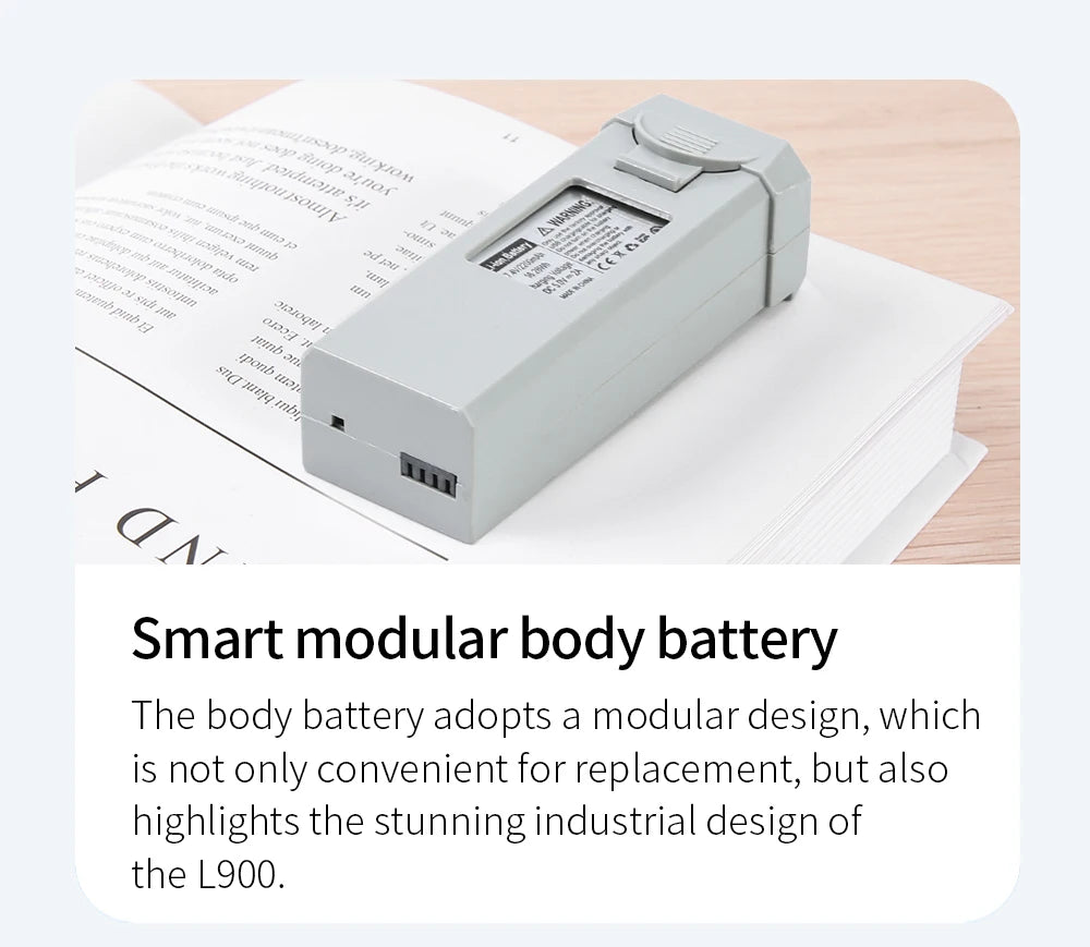 Smart modular body battery on a piece of paper with text describing its features.