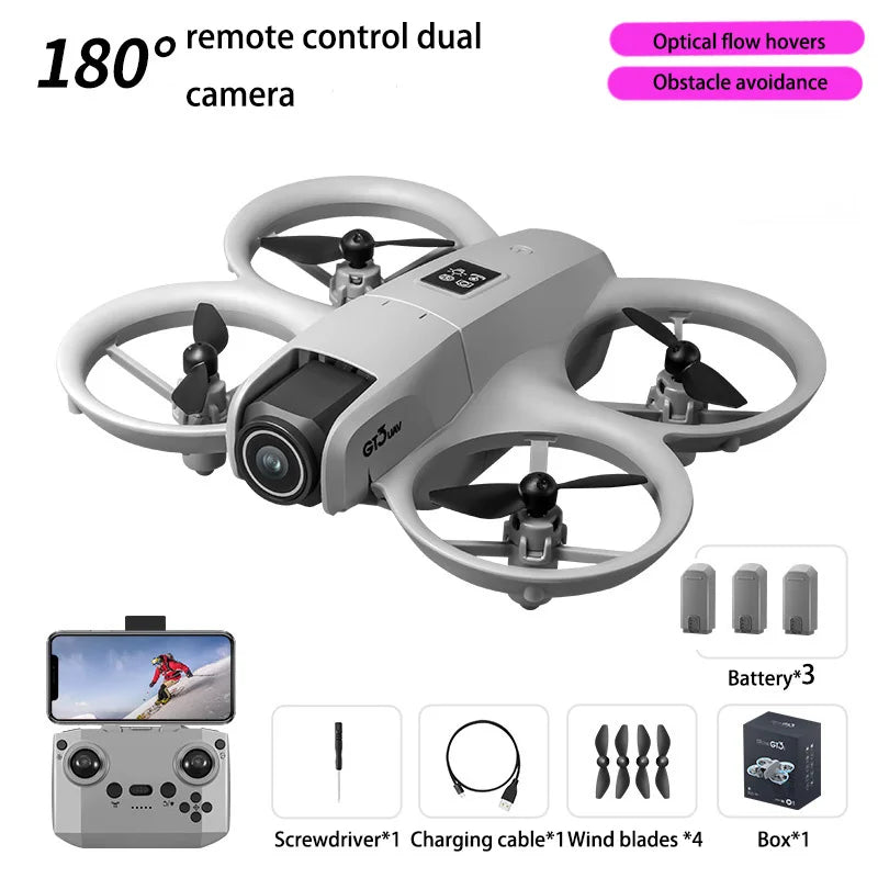 Gray drone with remote control, battery, and accessories on a white background