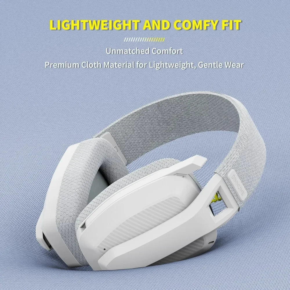 White headphones with gray headband on a light blue background, featuring text about comfort and material.