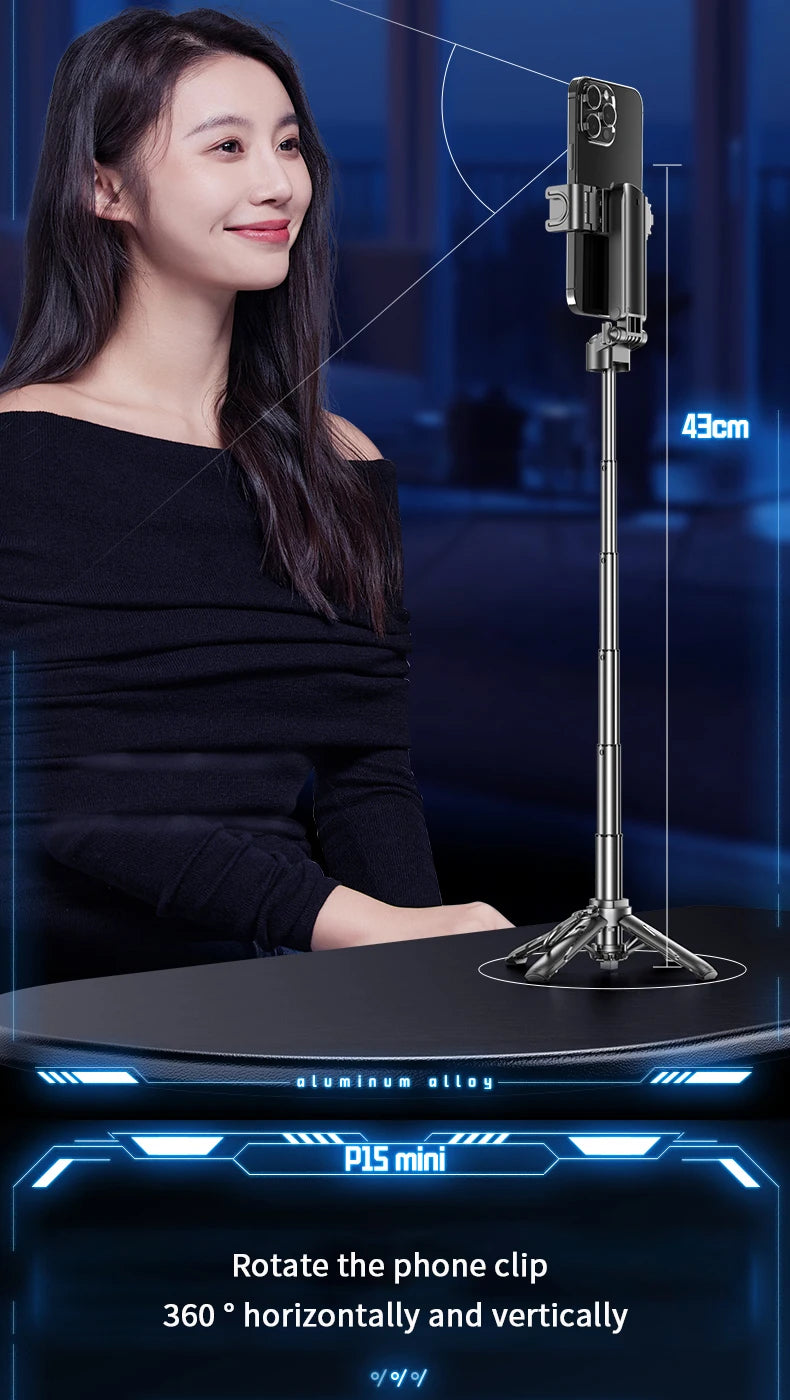 Woman sitting at a desk with a microphone stand and phone clip, set against a blue background.