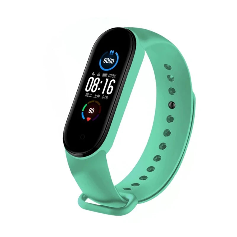 Mint green fitness tracker with a black screen on a white background