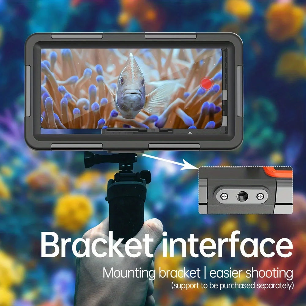 Camera screen displaying a fish and coral with a bracket interface on a blurred underwater background.