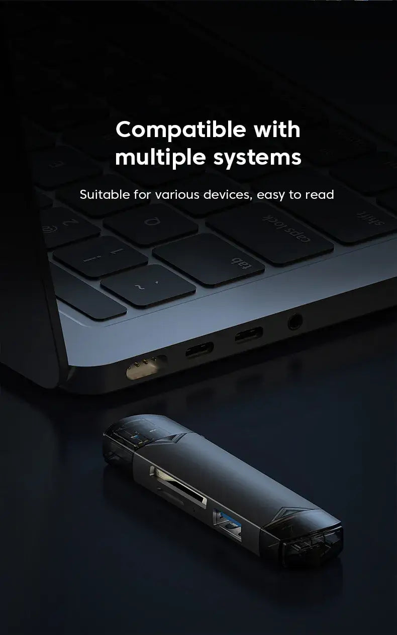 Black electronic device on a dark surface with text about compatibility