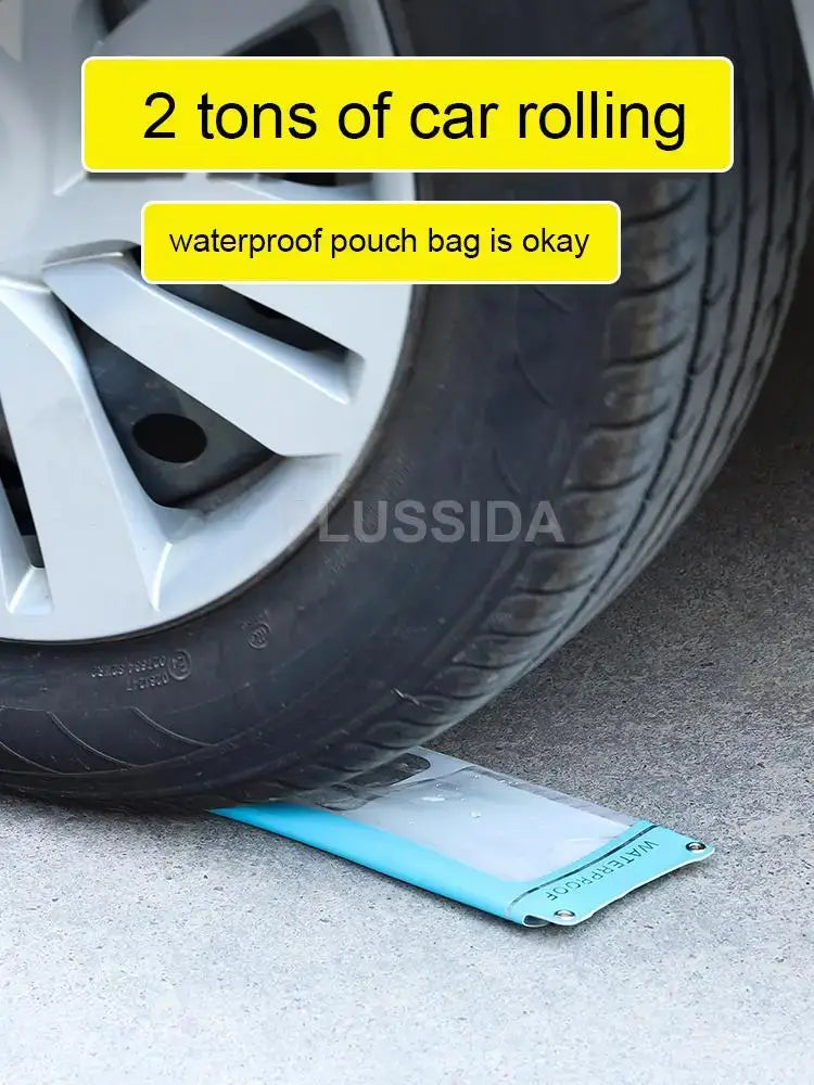 Car tire over a waterproof phone pouch bag labeled '2 tons of car rolling'