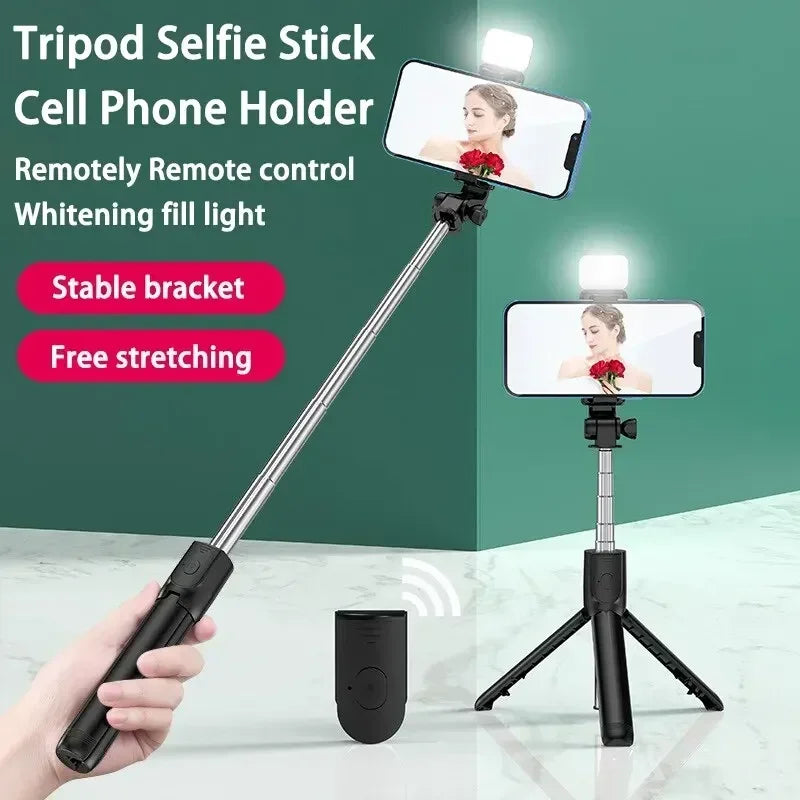 Tripod selfie stick with phone holder and remote control on a white background