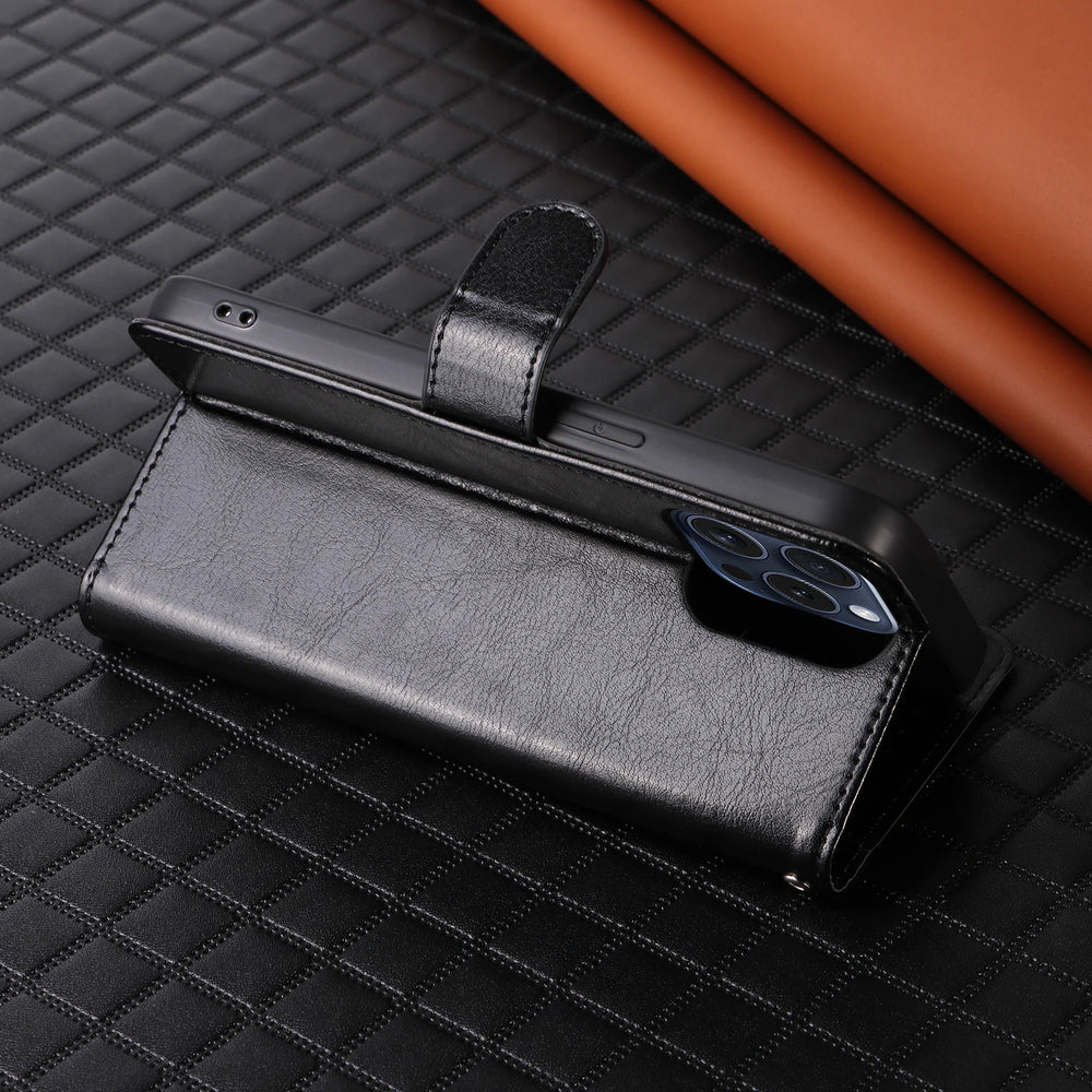 Black phone case with a phone inside on a textured surface