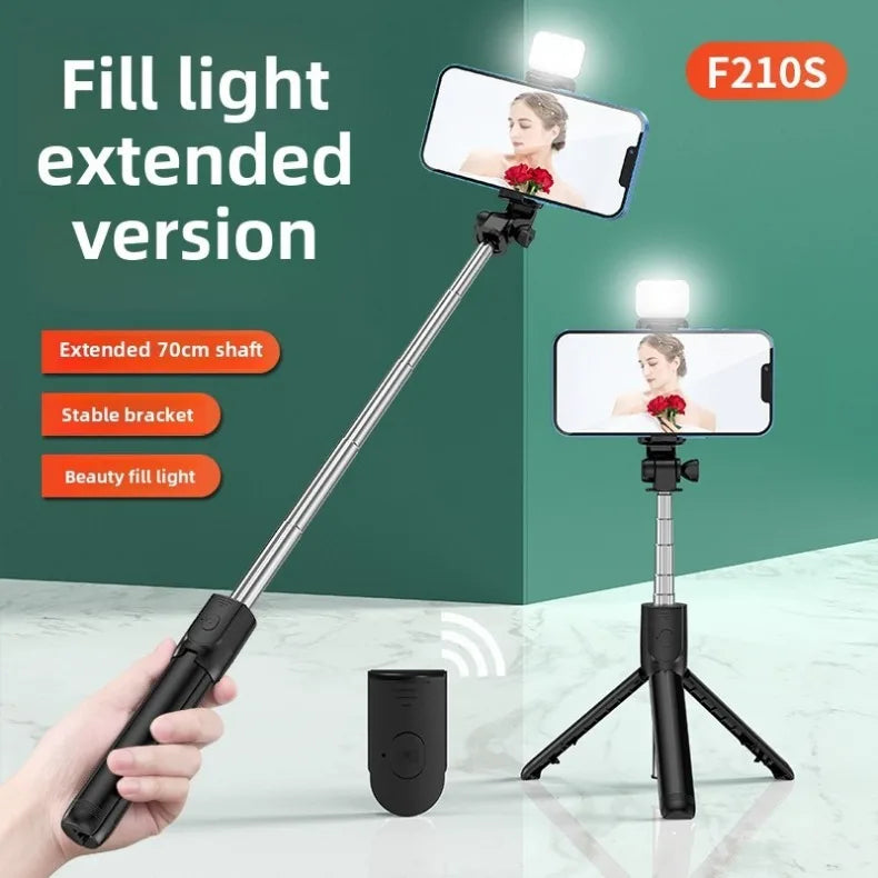Fill light extended version with smartphone holder and remote control on a white background