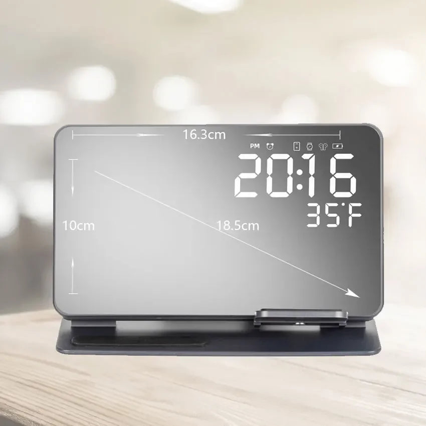 Digital clock with display on a wooden surface