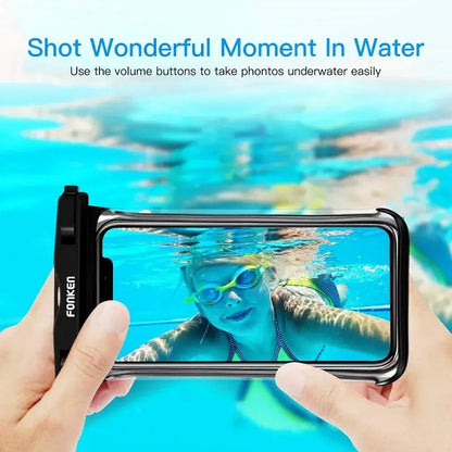Person underwater using a waterproof phone case to take photos
