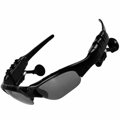 Black sunglasses with Bluetooth headset on a white background