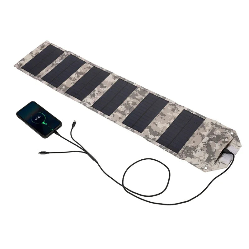 Camouflage-patterned solar panel with a smartphone attached on a white background