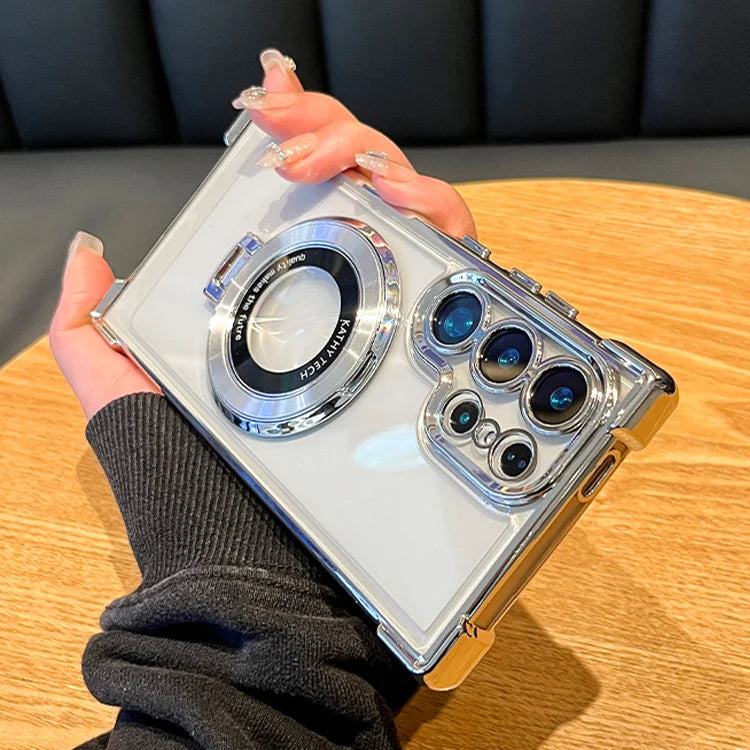 Clear phone case with camera lens design held by a person on a wooden table.