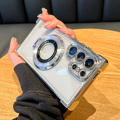 Clear phone case with camera lens design held by a person on a wooden table.