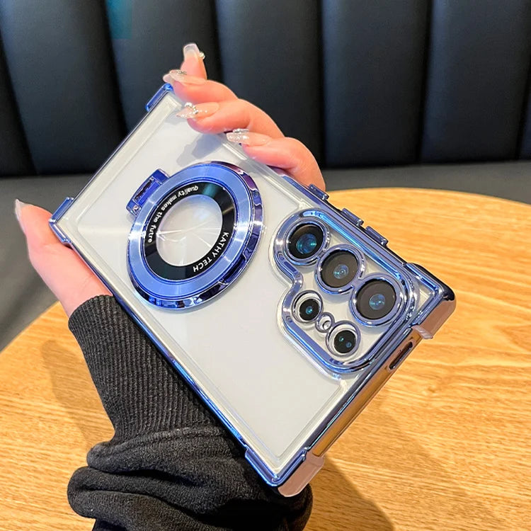 Clear phone case with blue accents held by a hand on a wooden table.