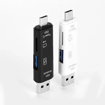 Two USB adapters, one black and one white, on a white background
