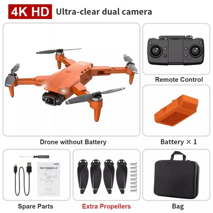 Orange drone with remote control, battery, spare parts, and bag on a white background