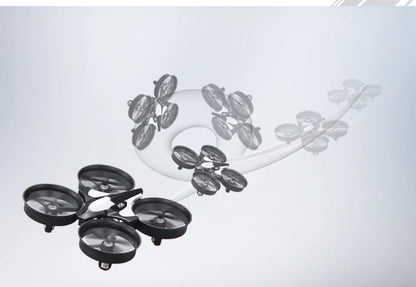 Black drone with propeller blades on a white background