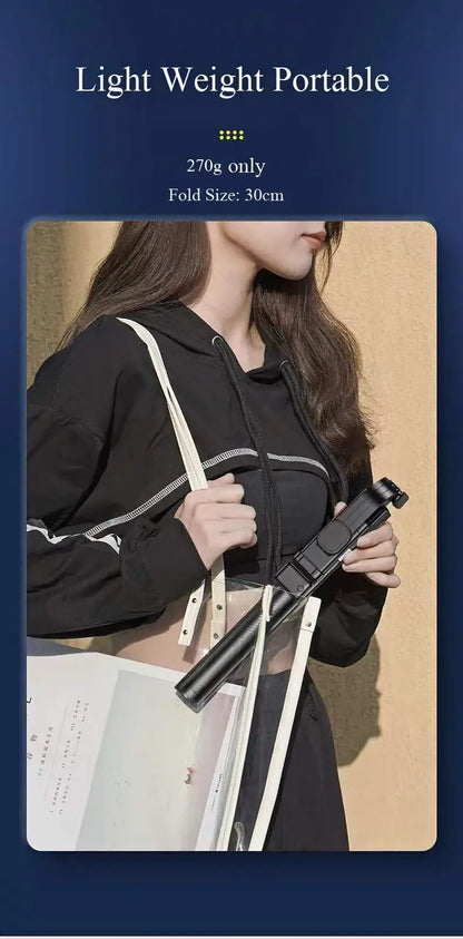Woman holding a black portable device with text indicating weight and size.