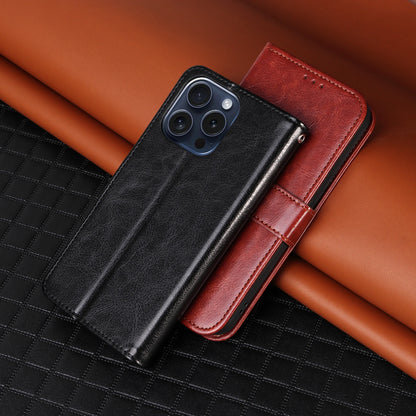 Black and brown phone cases on a textured surface