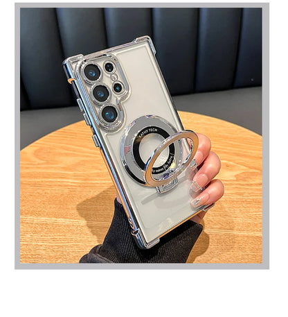 Phone case with ring holder held by a hand on a wooden surface