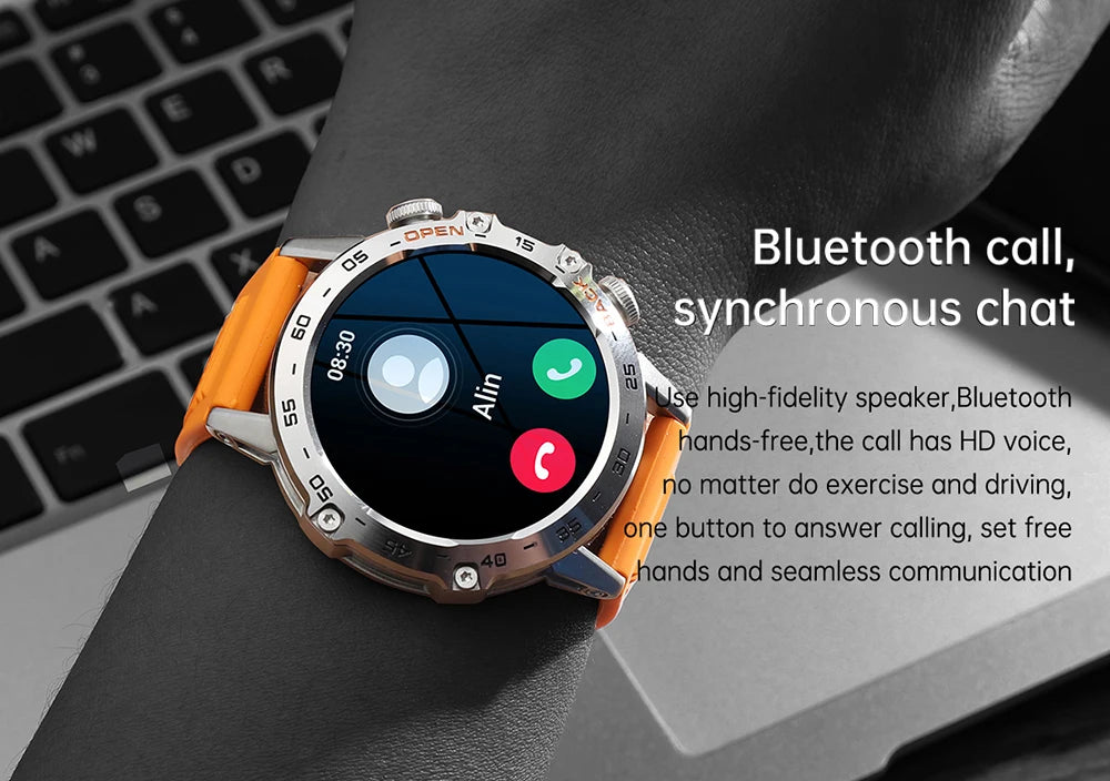 Smartwatch with orange band on a wrist, displayed against a blurred keyboard background.
