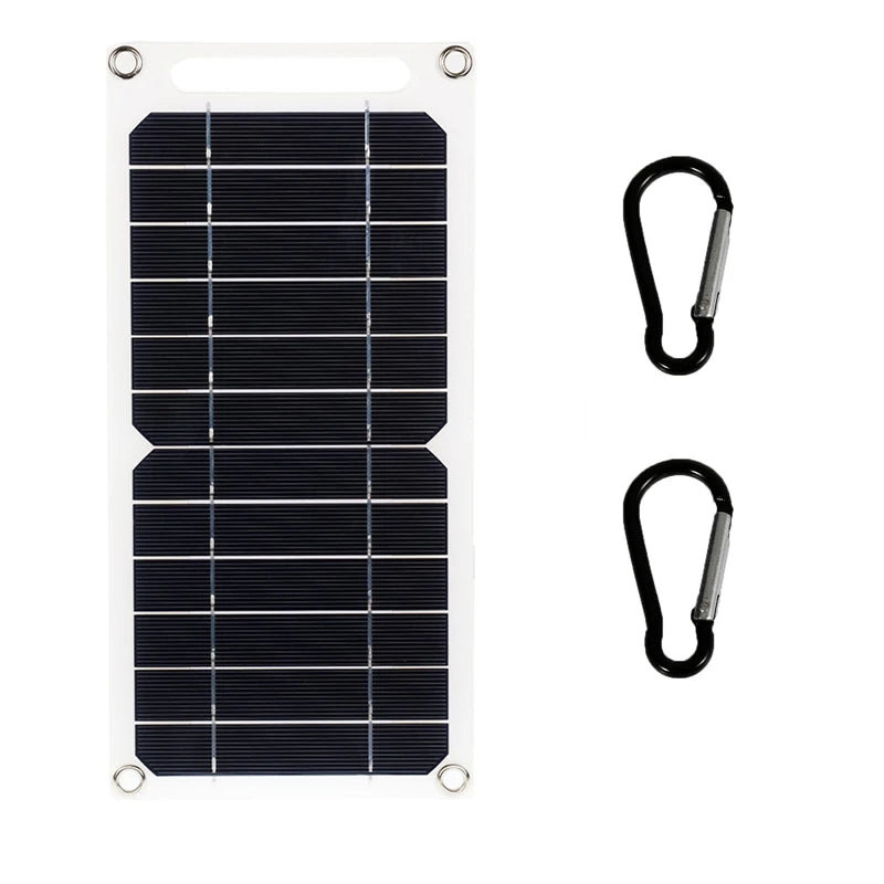 Foldable solar panel with two carabiners on a white background