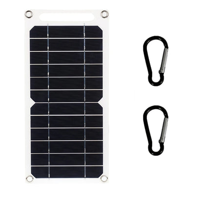 Foldable solar panel with two carabiners on a white background
