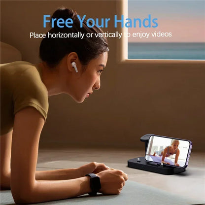 Woman using a smartphone with a screen stand, placed horizontally or vertically, in a room with a window.