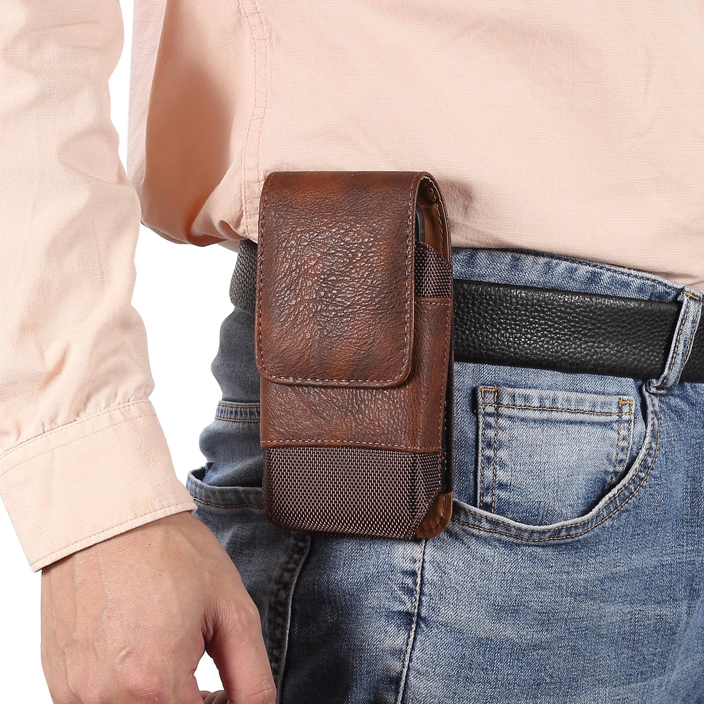 Person wearing a brown leather phone holster on their belt.