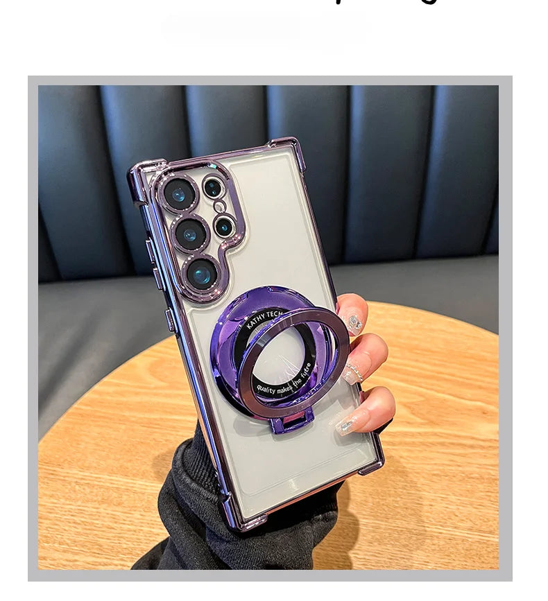 Phone case with a purple ring held by a hand on a wooden table.