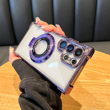 Clear phone case with purple accents held by a person on a wooden table.