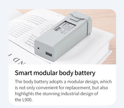 Smart modular body battery on a piece of paper with text describing its features.