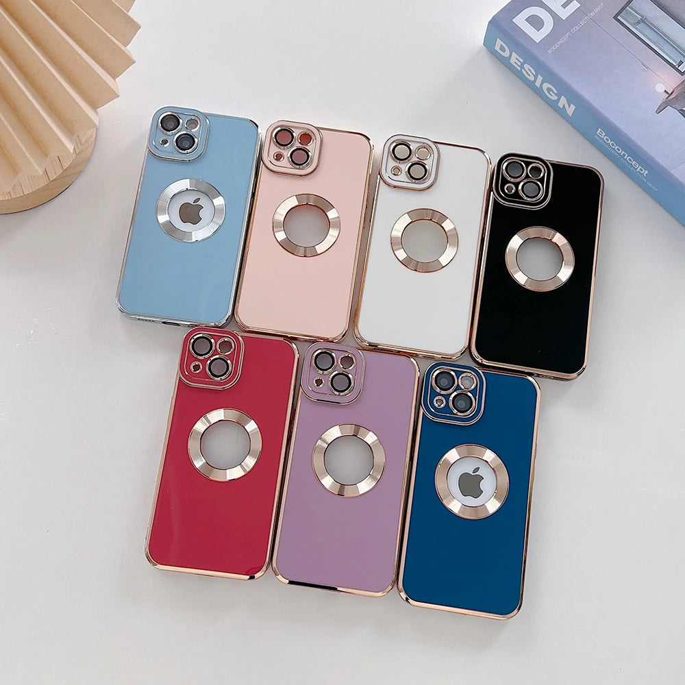 Collection of colorful phone cases with Apple logo on a light surface